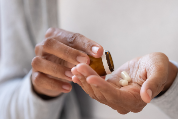 pharma market capsules poured in hand